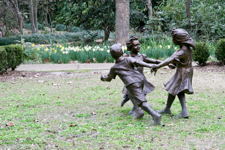 Children dancing sculpture